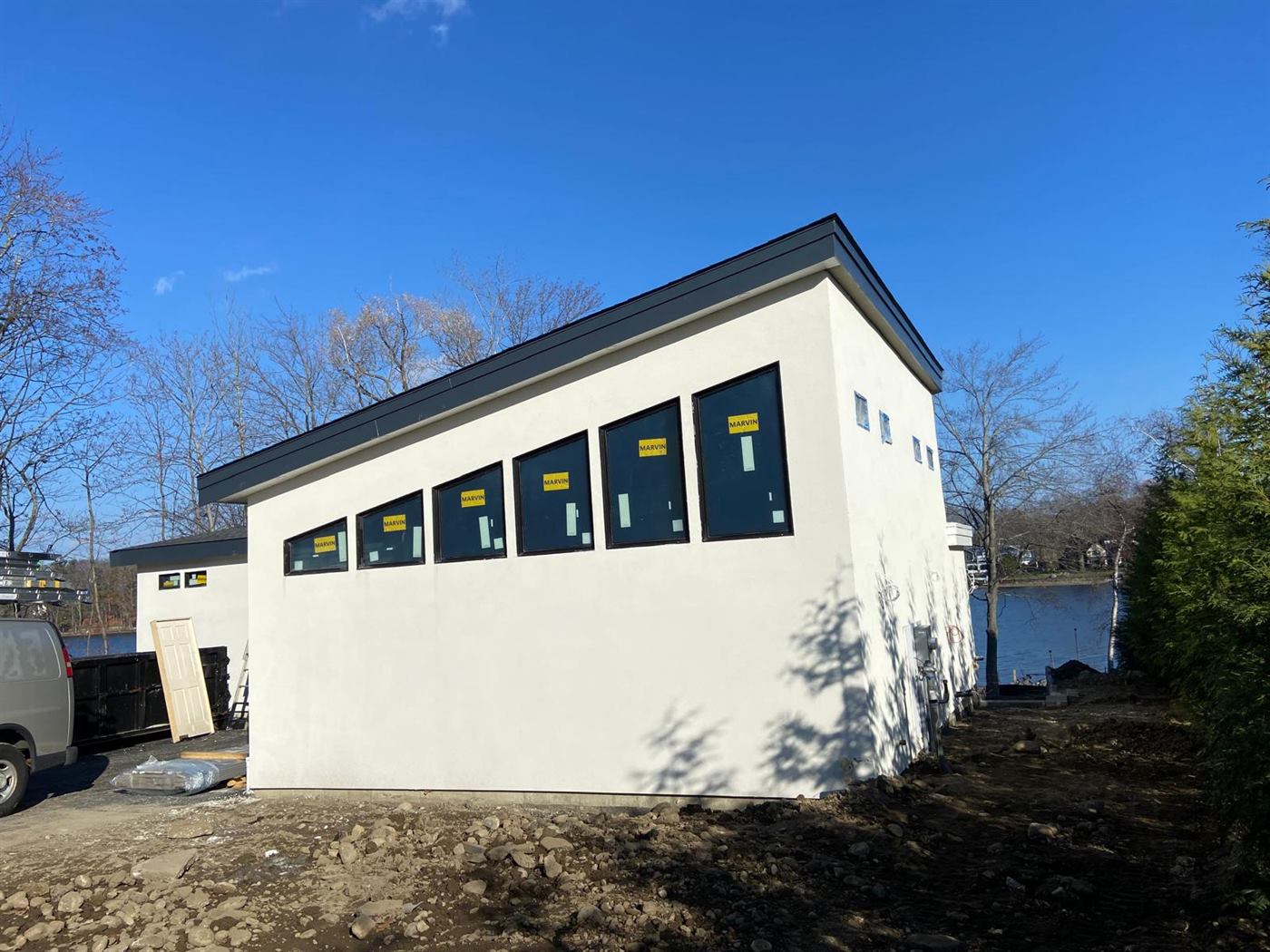 Lakeside building finished in stucco